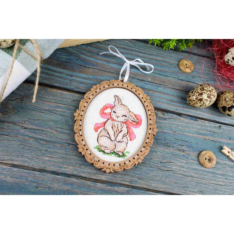 M.P.STUDIA Cross-stitch on wooden base. Miniature. Bunny with a bow O-128