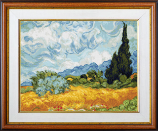 Wheatfield with cypresses